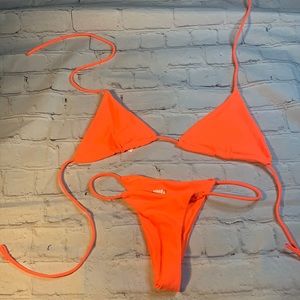 Neon bikini size medium. Never worn.